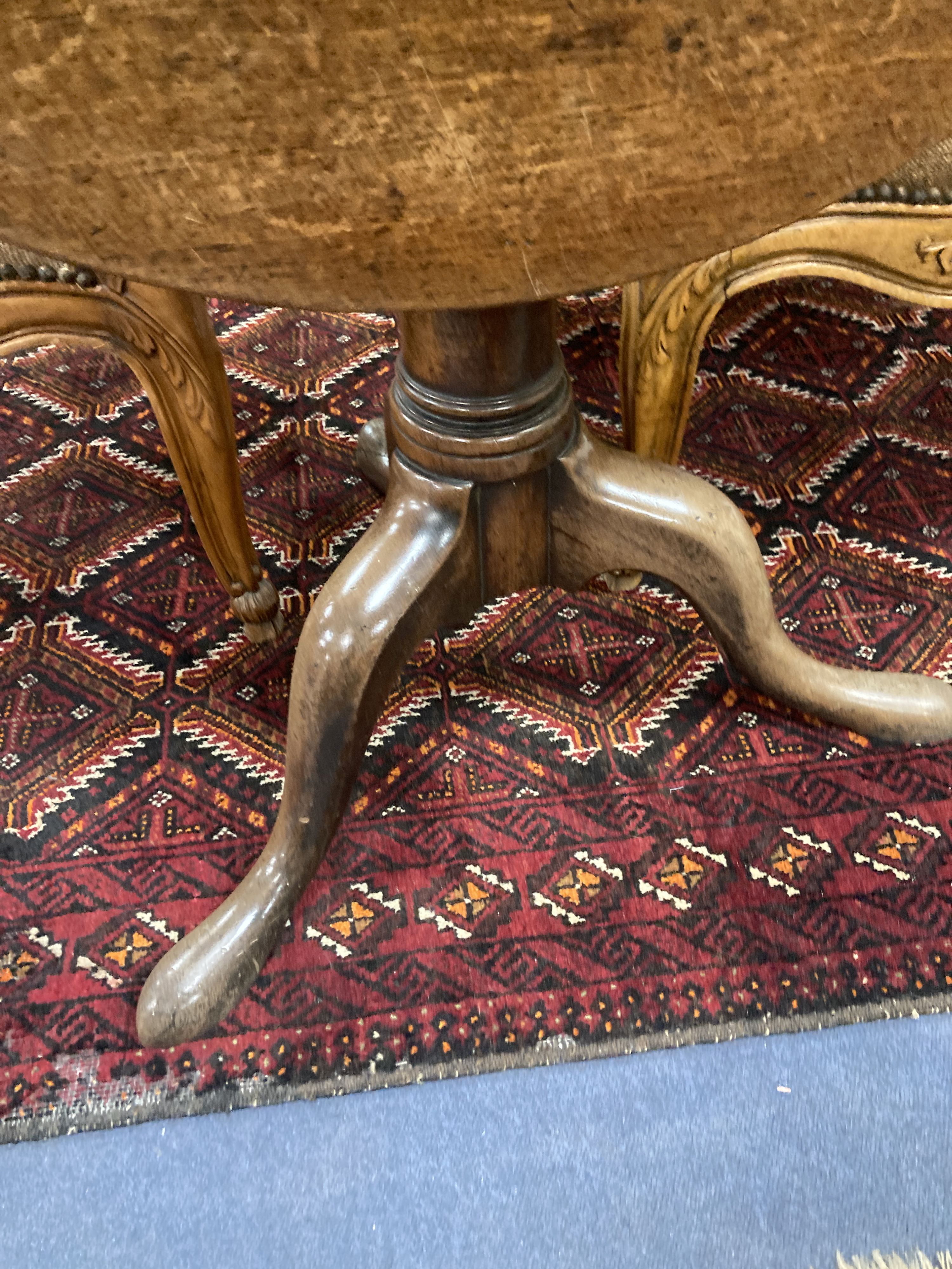 A mid 18th century mahogany tripod table with birdcage platform, diameter 76cm, height 70cm